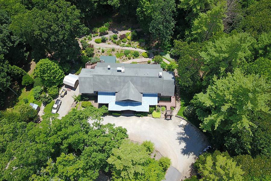 Aerial view of Bent Creek Lodge surrounded by forest