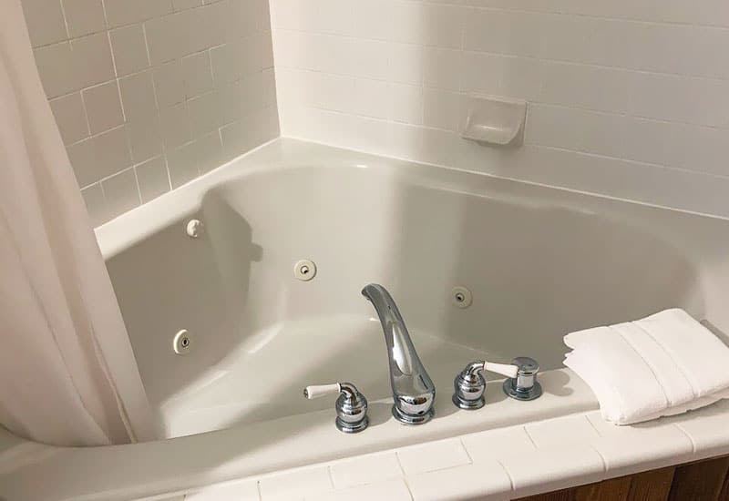 The two-person whirlpool tub in the Wildflower Room at Bent Creek Lodge