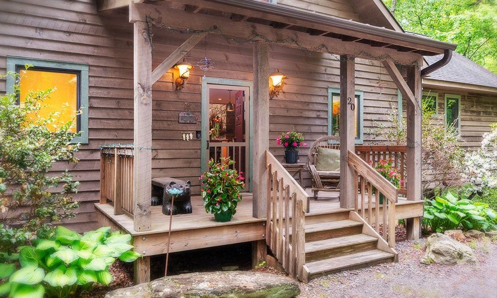 The Luhn House vacation rental next door to Bent Creek Lodge, with its own porch